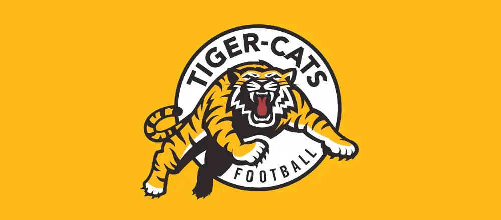 Hamilton Tiger-Cats running back indicates retirement; club now says he's  been let go